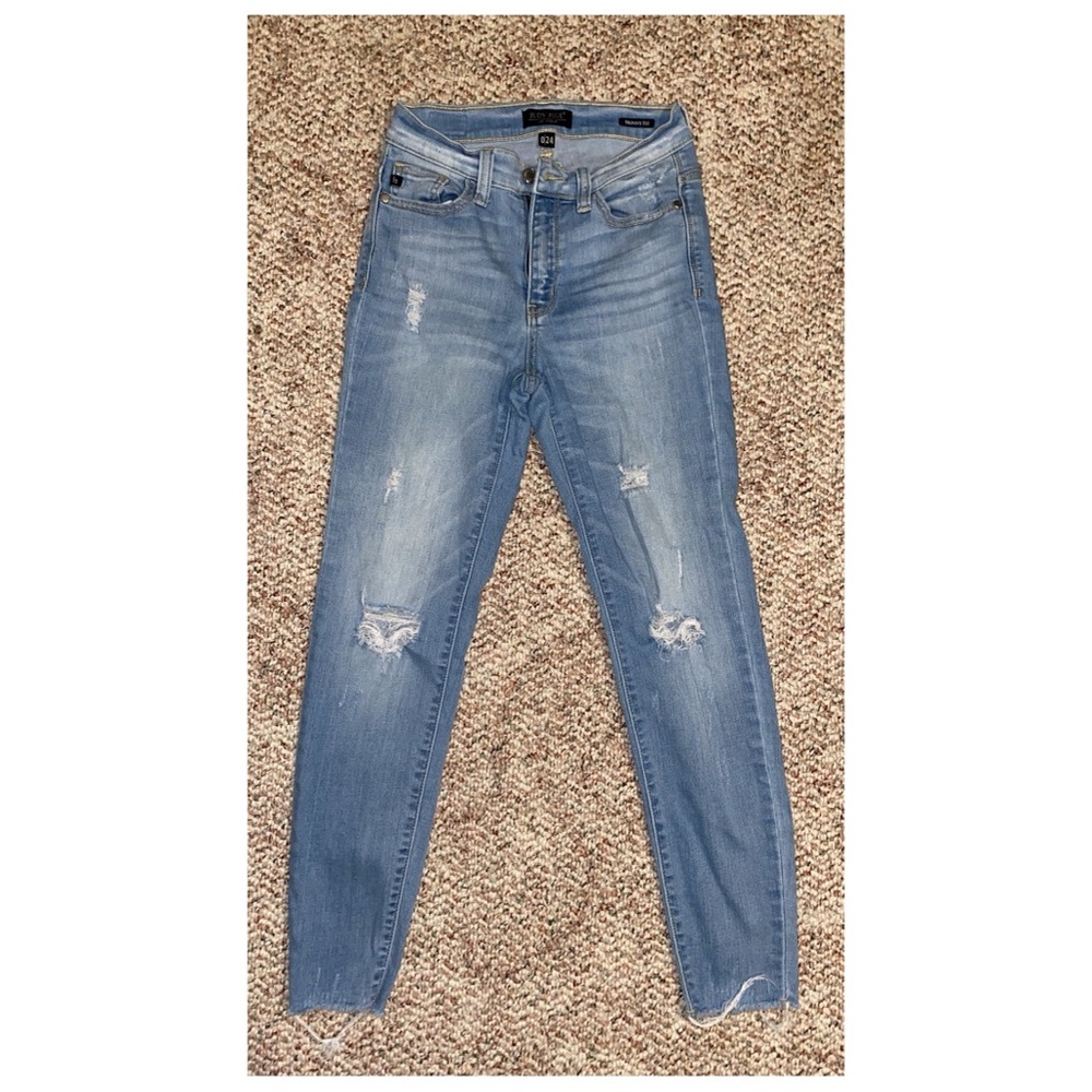 Just Blue light wash distressed jeans.